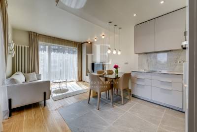 Designer two-bedroom apartment in a gated complex for rent