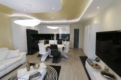 Дизайнерски тристаен апартамент в нова сграда под наем