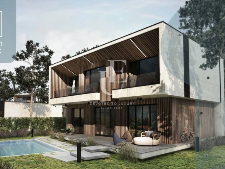 House on the seafront in a complex